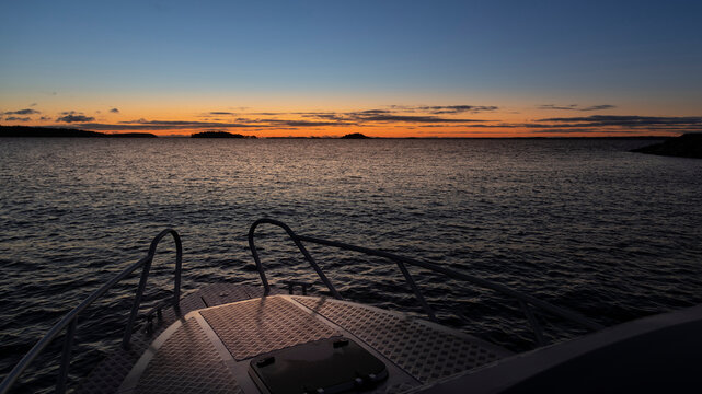 Bow of boat at sunset