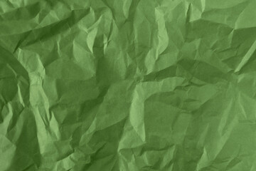Blank Creased or wrinkled craft green color recyclable organic paper bag texture background