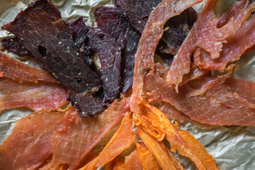 Beef and pork fresh meat with salt and spices on the table. Delicious tasty meat food 