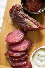 Beef and pork fresh meat with salt and spices on the table. Delicious tasty meat food 