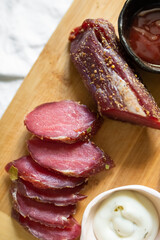 Beef and pork fresh meat with salt and spices on the table. Delicious tasty meat food 