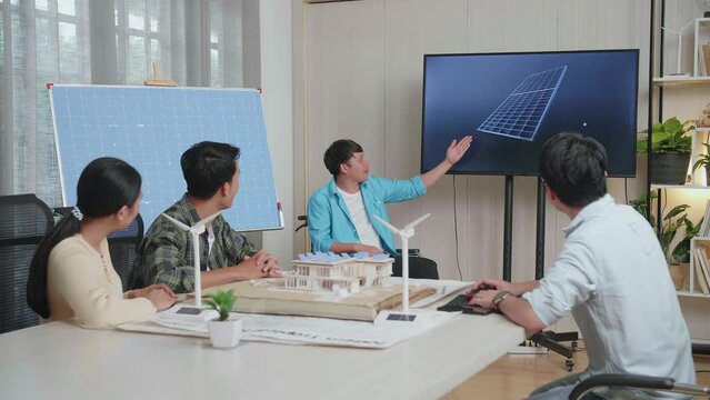 Asian Man Engineer In Wheelchair Succeed Presenting About The Work Of Solar Cell At The Office, Audience Clapping Hands And Feeling Impressive
