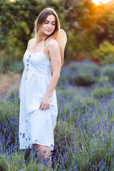 Young Woman in White Light Cotton Sundress. Eco Style in clothes.