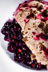 Dessert with currants and pieces of pastry