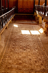 Ancient Greek floor mosaic in archaeologic park Kato Paphos, Cyprus.