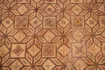 Ancient Greek floor mosaic in archaeologic park Kato Paphos, Cyprus.