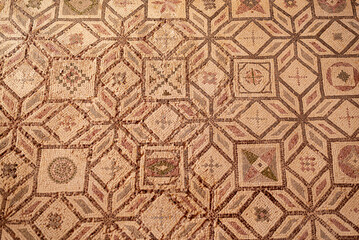 Ancient Greek floor mosaic in archaeologic park Kato Paphos, Cyprus.