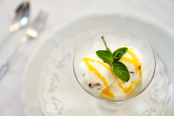 delicious lemon cream and mint leaves ice cream cup