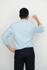 Back view of manager clenched fist to express excitement