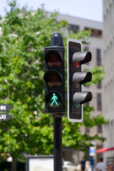 Pedestrian traffic light green color at City of Wallisellen, Canton Zürich, on a sunny summer day. Photo taken June 18th, Wallisellen, Switzerland.