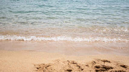 Sea quiet wave on a quiet scene in Mediterranean Beach in Catalonia, Costa Brava