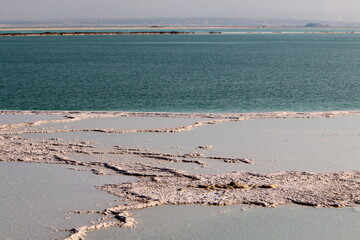 The Dead Sea is a salt lake between Israel, Jordan and the West Bank of the Jordan River.