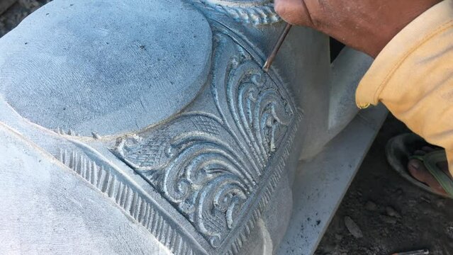 Artistic processing of stone Extreme Closeup. StoneMasons work. Stone Art in India, Odisha