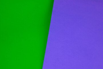 Dark vs light abstract Background with plain subtle smooth de saturated purple green colours parted into two