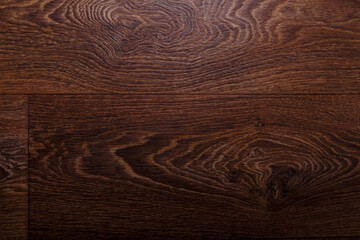 Brown linoleum with wooden textured surface, background backdrop texture. Floor changing, interior...