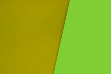 Dark vs light abstract Background with plain subtle smooth de saturated yellow green colours parted into two