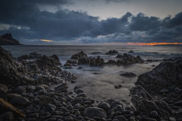 Sunrise on Reis Magos beach. Canico, Madeira, Portugal. October 2021. Long exposure picture