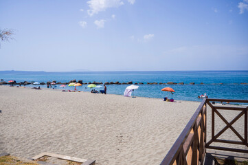 beach chairs and umbrellas
