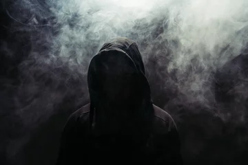 Foto op Aluminium Silhouette of hooligan on black background with smoke © LIGHTFIELD STUDIOS
