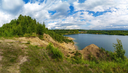 On the shore of the Pugarevsky quarry . Summer landscape. Leningrad region. Vsevolozhsk.
