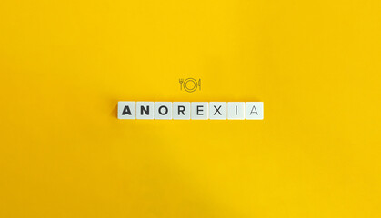 Anorexia Banner and Concept. Word on Block Letter Tiles on Yellow Background. Minimal Aesthetics.
