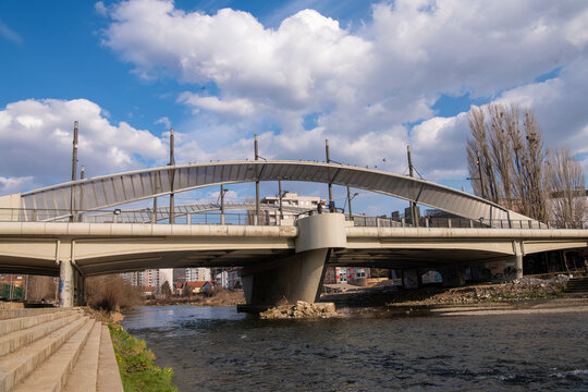 The New Bridge is a steel truss bridge crossing the Ibar river in Mitrovica, symbol of the separation between Albanians and Serbs ethnically divided city. a city in northern Kosovo, Serbia 04.03.2022