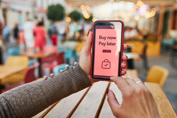 BNPL Buy now pay later online shopping service on smartphone. Online shopping. Paying after delivery. Complete the payment after purchase at no added cost. Payment after credit check - obrazy, fototapety, plakaty