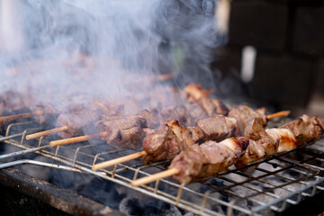 Barbecued liver shish kebab, Turkish traditional popular meal barbecued liver shish kebab. Closeup photo with copy space. Meats cooked under the fumes of charcoal. Smoked food flavor concept idea.