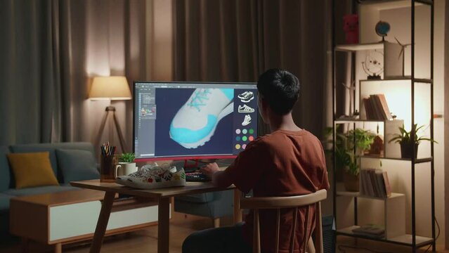 Asian Boy Footwear Designer Having A Headache While Designing Shoe On A Desktop At Home. Shoe Production Procedure Concept 
