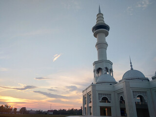 Beautiful mosque with sunset in the background. Masjid Sultan Mahmud Riayat Syah - Batam, Indonesia