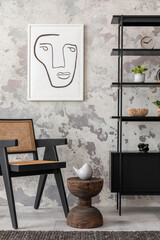 The stylish composition of wabi sabi interior with mock up poster, black rack, rattan armchair, carpet, coffee table and personal accesoories. Grey concrete wall. Home decor. Template.
