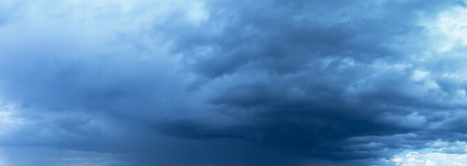 Light in the Dark and Dramatic Storm Clouds background