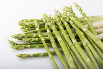green asparagus on white background