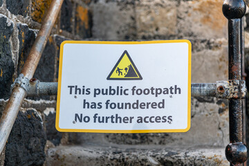This Public Footpath Has Foundered warning sign on the Cornish coast