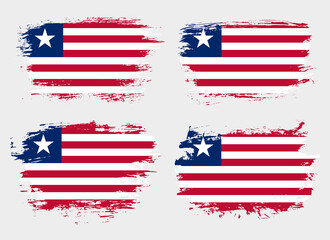 Artistic Liberia country brush flag collection. Set of grunge brush flags on a solid background