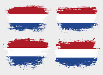 Artistic Netherlands country brush flag collection. Set of grunge brush flags on a solid background
