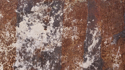 Sheet of rusty iron with white paint on it, texture of an old rusted metal iron sheet, rusty iron sheet surface 
