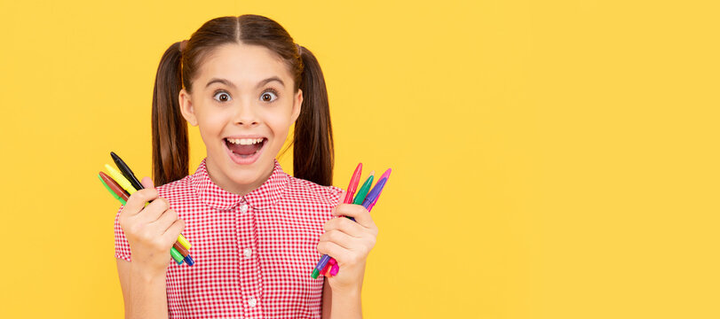 amazed teen girl hold colorful markers office supplies for painting, creative mind. Portrait of schoolgirl student, studio banner header. School child face, copyspace.
