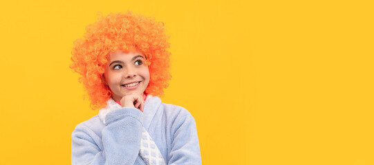good morning. childhood happiness. birthday or pajama party. funny kid in curly clown wig. Funny teenager child on party, poster banner header with copy space.