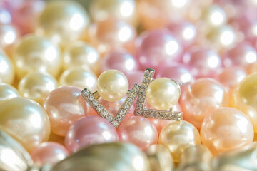 A beautiful Pearl Ear studs. Close-up of white pearl earrings.
