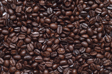 Roasted coffee beans, can be used as a background.