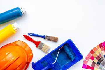Paint roller and color palette guide. House renovation tools