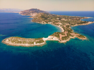 Fototapeta na wymiar panoramic aerial shot drone of extreme north of Milos island, Greece. view with mountains, coast line