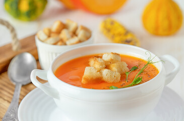 Pumpkin soup with croutons. Close up