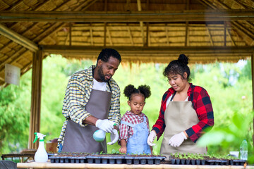 African american family are spending time together at the organic farm