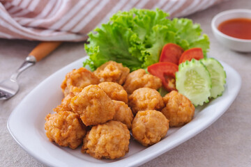 Deep fried shrimp ball and vegetable on plate