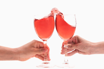 Female hands having a toast with red wine