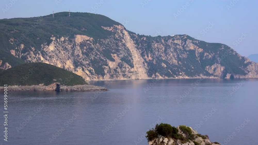 Wall mural View from hilltop in Palaiokastritsa village, Corfu Island in Greece, 4k