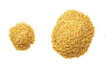 raw bulgur isolated on white background top view. Pile dry bulgur isolated on white background top view.