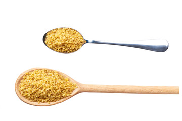 wooden and metal spoon with raw bulgur isolated on white background top view.